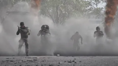 WARDOGS squad advancing through smoke